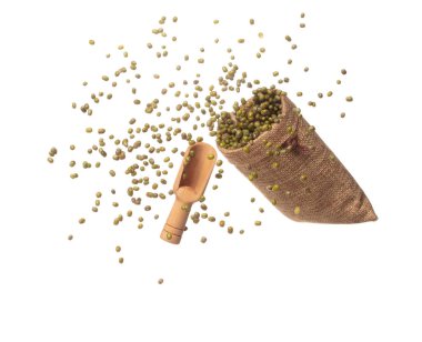 Green mung beans fly throw up in Sack Bag, green mung bean float explode, abstract cloud fly. Dried green mung beans splash throwing in Air. White background Isolated high speed shutter, freeze motion