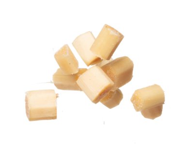 Sugar cane cut chop flying explosion, yellow chop sugarcane abstract cloud fly. Sugar sugarcane cut cubes splash stop in air, food object design. white background isolated high speed freeze motion