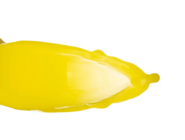 黄色の液体爆発飛んで 顔料トウモロコシのバナナジュース新鮮なフロート空中に注ぐ 黄色の塗料の色スプラッシュドロップ抽象的な流出 白の背景隔離された高速シャッター 凍結停止を投げる — ストック写真