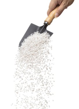 Perlite rock flying explosion, perlite white stone fall down from hand shovel garden. Perlite volcano stone splash throwing in Air. White background Isolated high speed shutter, freeze action