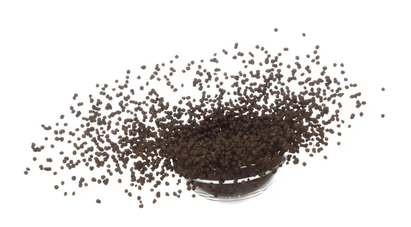 肥料茶色の化学は成長を加速させるハエの秋の爆発 空中で浮遊投げを植えるための多くの小さなボール肥料 白地分離高速凍結運動 — ストック写真