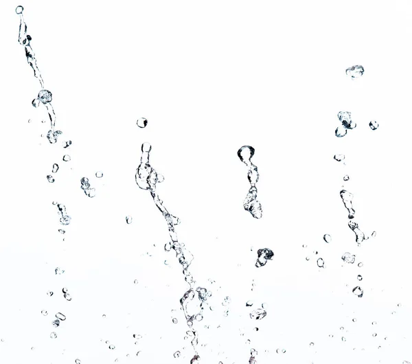 形状空気になびくドロップウォーターライン管攻撃に水のスプラッシュの液滴を形成し 動き凍結ショットを停止します テクスチャグラフィックリソース要素のためのスプラッシュ水 白の背景分離 — ストック写真