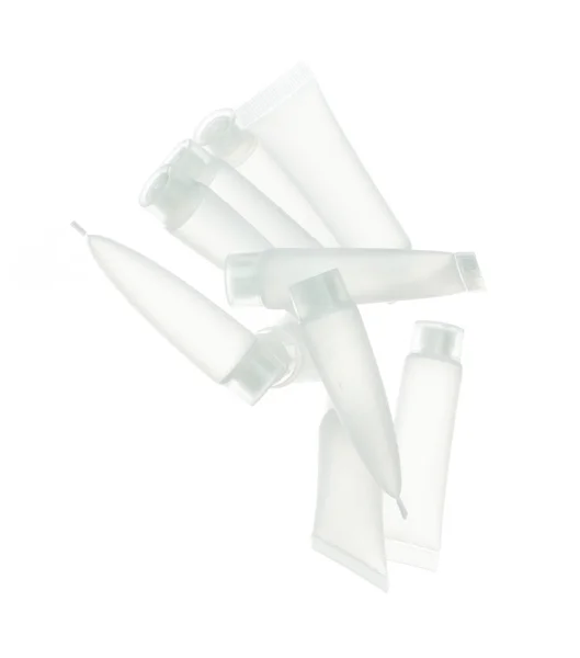 Kozmetik Kabı Beyaz Şişe Sıçratıyor Havada Tüp Şeffaf Birçok Nemlendirici — Stok fotoğraf