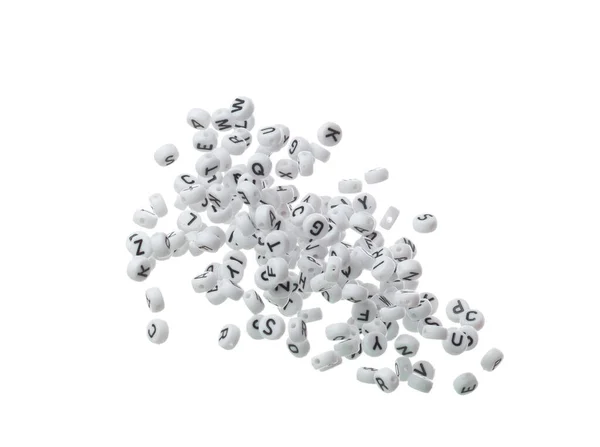 Alphabet letter word plastic bead explode fly in air. Many group of bead screen type font of english letter word in alphabet. White background isolated