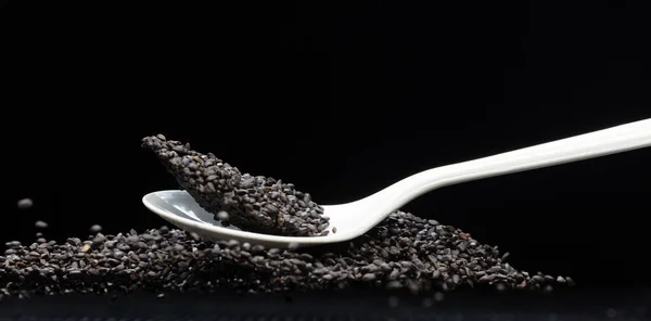 Black Sesame Seeds Flying Explosion Black Grain Wave Floating Abstract — Stock Photo, Image