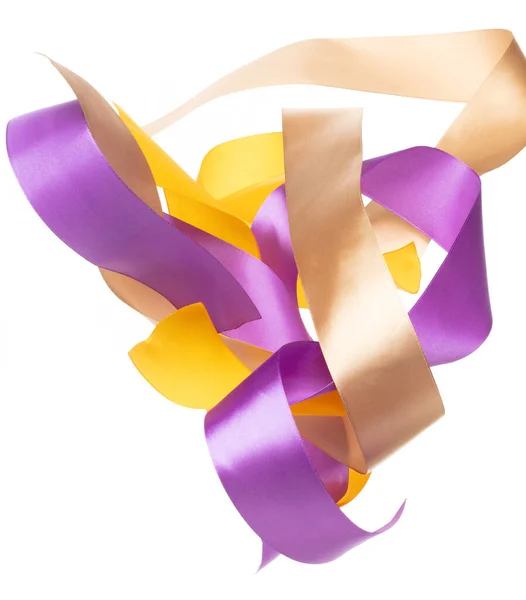 Yellow Gold Purple ribbon long straight fly in air with curve roll shiny. Yellow Golden Purple ribbon for present gift birthday party to wrap around decorate and make of textile cloth long straight.