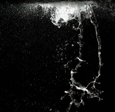 Su sıçratma duvarda kanat çırpan su saldırısına yol açar ve hareketli dondurucu atışı durdurur. Patlama dokusu, grafik kaynak elementleri, siyah arkaplan izole