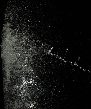 Su sıçratma duvarda kanat çırpan su saldırısına yol açar ve hareketli dondurucu atışı durdurur. Patlama dokusu, grafik kaynak elementleri, siyah arkaplan izole