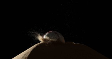 Beyzbol topu kum toprağı ve kum tepesine çarpıp tüm bölgeye sıçradı. Beyzbol kum tepesini rüzgar fırtınası üzerine vurdu ve dağın üzerinden toz bulutu sıçradı. Siyah arkaplan izole