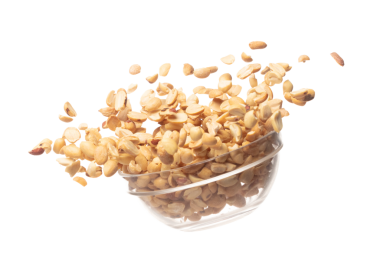 Roasted Peanut bean fall throw up in glass bowl, Roasted Peanut bean float explode, abstract cloud fly. Roasted Peanut beans splash throwing in Air. White background Isolated high speed shutter