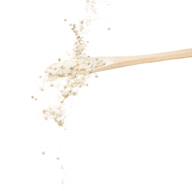 White Pepper seeds fall down pour in wooden spoon, white Pepper mix powder float explode, abstract cloud fly. Peppercorn mix powder splash throwing in Air. White background Isolated high speed shutter