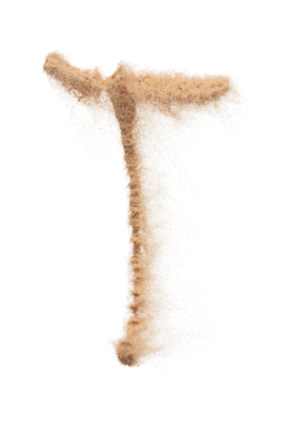 İngiliz alfabesi, Kum patlaması ve T İngiliz alfabesi, yazı için boşluk var. Havada uçan kum parçacığı nesnesi kavramı. Beyaz arkaplan izole edilmiş fırlatma ögesi nesnesi