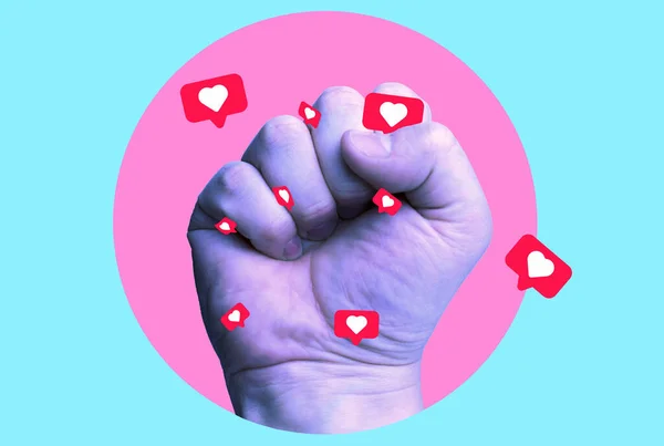 Human fist with likes as a concept of social media addiction. Fist with likes in neon color.