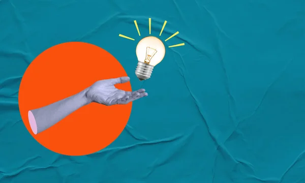 Creativity and new ideas in business. Art collage. A hand and a light bulb on a blue paper background. Concept of ideas and inspiration.