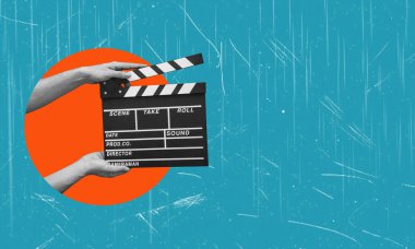 El çırpma tahtası stüdyoda video sineması yapıyor. Film yapım alkış tahtası. Aksiyon, tiyatro günü.
