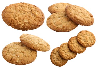 Ev yapımı pişirme seti, beyaz arka planda yulaflı kurabiyeler. Lezzetli ve tatlı fırınlanmış yiyecekler konsepti