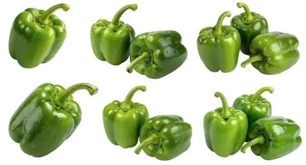 Beyaz arka planda yer alan Bulgar yeşil biberleri yemek menülerinde veya restoran dekorasyonunda kullanılıyor. Lezzetli ve sağlıklı yemek kavramı..