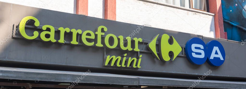 ISTANBUL, TURKEY - June 15, 2025. The CarrefourSA mini logo in the city. The concept of a good and reliable store.