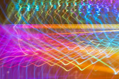 Eteral neon renkli ışık çizgileri. Tekrarlayan desen, fütüristik parlak dalga ve çizgi sanatı. Holografik. Işıklar ve renkler.