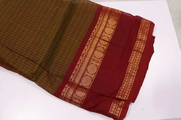stock image women Traditional Handmade Work Manthalir and Maroon Colour Cotton Half Saree Isolated on White Background