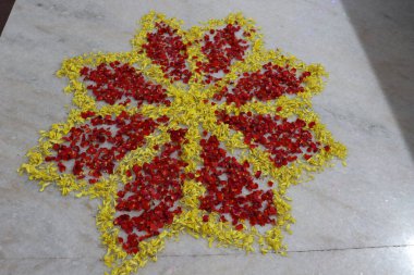 colorful flowers stacked up to create bathukamma, a specific hindu god worshiped in south india clipart