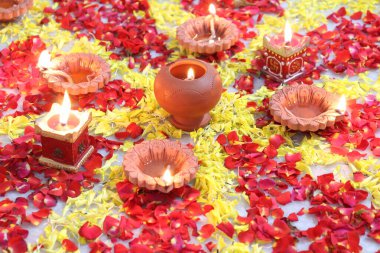 colorful flowers stacked up to create bathukamma, a specific hindu god worshiped in south india clipart