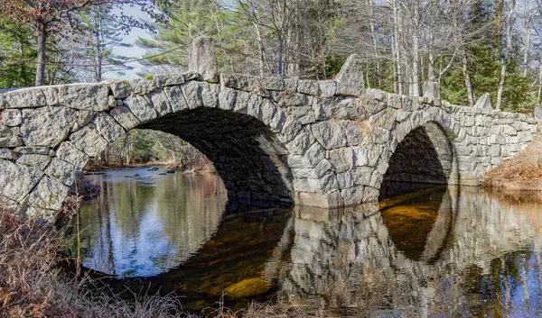 Old Stone Arch Bridge:  A bridge built in the mid-nineteenth century from stones cut to fit without mortar is a National Historic Civil Engineering Landmark located in southern New Hampshire.