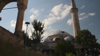 Bosnian Mosque Summer Day with Blue Sky and Clouds, Establishing Shot. High quality 4k footage