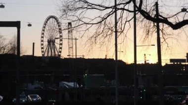 Silhouette of Ferris Wheel at Sunset, Liseberg Amusement Park, Gothenburg. High quality 4k footage