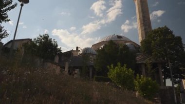 Mosque on a Lush Hill and Blue Sky With Few Clouds, Islamic Architecture scene. High quality 4k footage