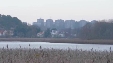 Coastal View with Suburban Cityscape Vastra Frolunda, Gothenburg, Sweden. High quality 4k footage