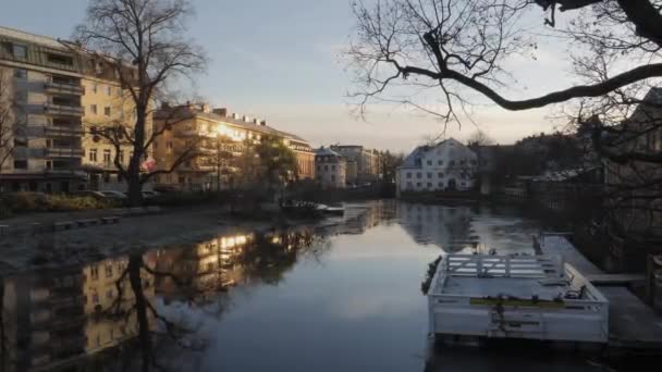Fyris River Water Reflection Sunrise Downtown Uppsala Sweden Pan Shot — стоковое видео