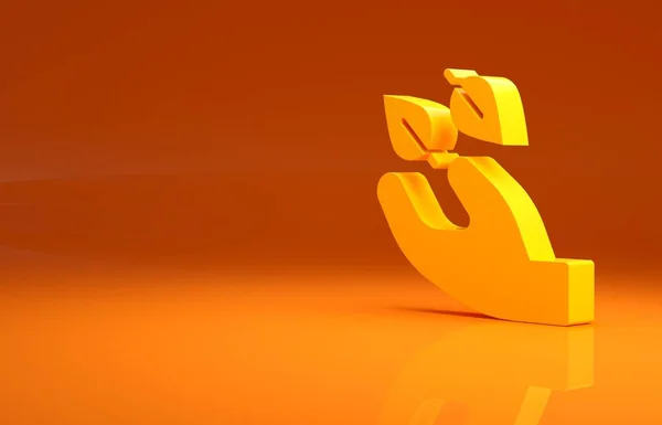 Gelbes Teeblatt Der Hand Isoliert Auf Orangefarbenem Hintergrund Teeblätter Minimalismus — Stockfoto