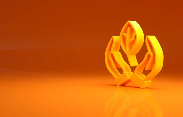 Желтая Рука Держит Лист Иконки Растения Выделенный Оранжевом Фоне Забота — стоковое фото