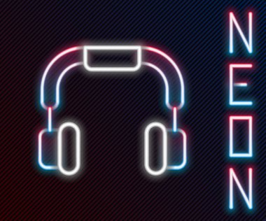 Parlayan neon hattı kulaklık simgesi siyah arkaplanda izole edildi. Kulaklıklar. Müzik, hizmet, iletişim ve operatör konsepti. Renkli taslak konsepti. Vektör
