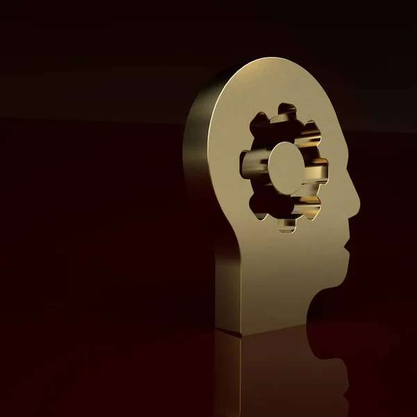 Gold Human head with gear inside icon isolated on brown background. Artificial intelligence. Thinking brain. Symbol work of brain. Minimalism concept. 3D render illustration.