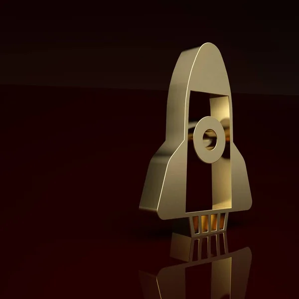 Gold Rocket ship icon isolated on brown background. Space travel. Minimalism concept. 3D render illustration.