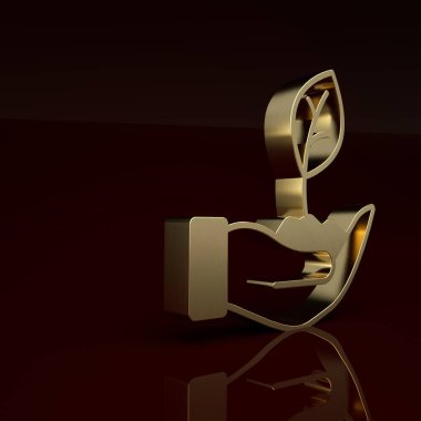 Çevre koruma ikonunun elindeki altın fabrikası kahverengi arka planda izole edilmiş. Tohum ve tohum. Fidan dikiyorum. Minimalizm kavramı. 3 Boyutlu resimleme.