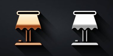 Siyah arkaplanda altın ve gümüş masa lambası ikonu var. Uzun gölge tarzı. Vektör