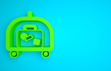 Green Hotel luggage cart with suitcase icon isolated on blue background. Traveling baggage sign. Travel luggage icon. Minimalism concept. 3D render illustration.