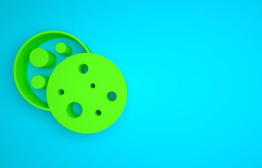 Green Cookie or biscuit with chocolate icon isolated on blue background. Minimalism concept. 3D render illustration.