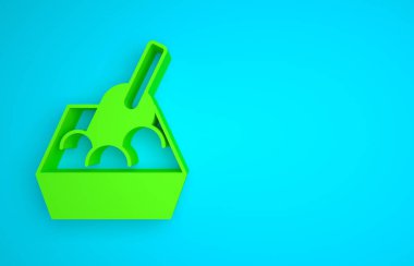 Green Cat litter tray with shovel icon isolated on blue background. Sandbox cat with shovel. Minimalism concept. 3D render illustration.