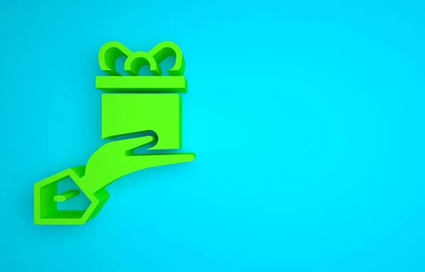 Green Give gift icon isolated on blue background. Gift in hand. The concept of giving and receiving a gift. Minimalism concept. 3D render illustration.