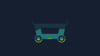 Yellow Mine cart with gold icon isolated on blue background. 4K Video motion graphic animation.