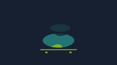 Yellow Stack hot stones icon isolated on blue background. Spa salon accessory. 4K Video motion graphic animation.
