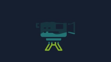 Yellow Retro cinema camera icon isolated on blue background. Video camera. Movie sign. Film projector. 4K Video motion graphic animation.