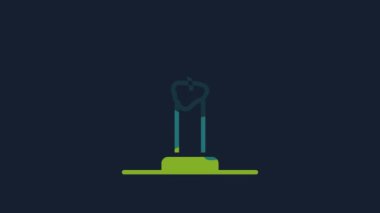 Yellow Burning candle in candlestick icon isolated on blue background. Cylindrical candle stick with burning flame. 4K Video motion graphic animation.