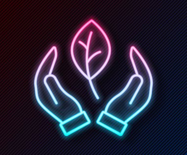 Parlayan neon çizgisi. El, siyah arkaplanda izole edilmiş bitki ikonunun bir yaprağını tutuyor. Doğayı koru. Yaprak, çevre korumasıyla çekiliyor. Vektör