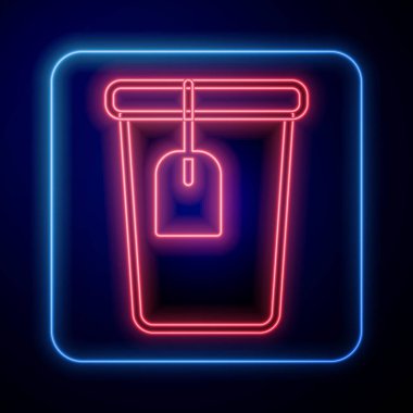 Glowing neon Cup with tea bag icon isolated on black background.  Vector