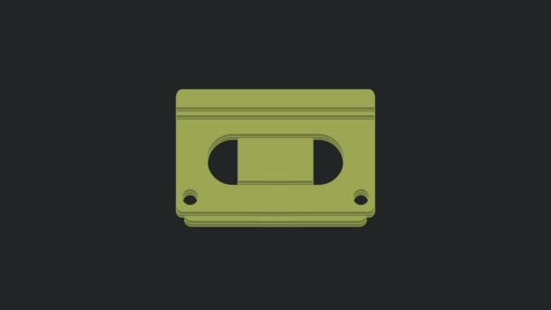 黒の背景に隔離された緑のVhsビデオカセットテープアイコン 4Kビデオモーショングラフィックアニメーション — ストック動画
